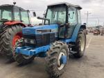 Трактор с/х New Holland 40 Series PowerStar 7740 модификация сельскохозяйственный трактор средний класс гв 1996–1997 кабина 4х4 наработка 5143 мч синий