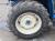 Трактор с/х New Holland 40 Series PowerStar 7740 модификация сельскохозяйственный трактор средний класс гв 1996–1997 кабина 4х4 наработка 5143 мч синий