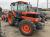Трактор с/х Kubota M Series Grandom M125 модификация сельскохозяйственный трактор средний класс гв 2002 – 2004 кабина 4х4 наработка 1020 мч красный