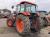 Трактор с/х Kubota M Series Grandom M125 модификация сельскохозяйственный трактор средний класс гв 2002 – 2004 кабина 4х4 наработка 1020 мч красный