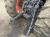 Трактор с/х Kubota M Series Grandom M125 модификация сельскохозяйственный трактор средний класс гв 2002 – 2004 кабина 4х4 наработка 1020 мч красный