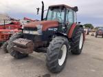 Трактор с/х New Holland M Series M135 модификация сельскохозяйственный трактор средний класс гв 1997 - 2003 кабина 4х4 наработка 3381 мч коричневый