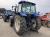 Трактор с/х New Holland TS Series TS110 модификация сельскохозяйственный трактор средний класс гв 2001 – 2003 кабина 4х4 КУН наработка 8063 мч синий