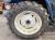 Трактор с/х New Holland TS Series TS110 модификация сельскохозяйственный трактор средний класс гв 2001 – 2003 кабина 4х4 КУН наработка 8063 мч синий