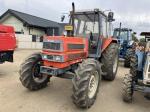 Трактор с/х Kubota M1 Series M1-100DT модификация сельскохозяйственный трактор средний класс гв 1988 – 1998 кабина 4х4 наработка 1689 мч красный
