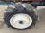 Минитрактор с/х Kubota L1 Series Sunshine L1-20D системы – Monroematic; AITC; Bi-Speed Turn; Wet Disc Brakes; Independent Braking, модификация сельскохозяйственный мини трактор гв 1983 – 1988 крыша 4х4 фреза наработка 761 мч красный