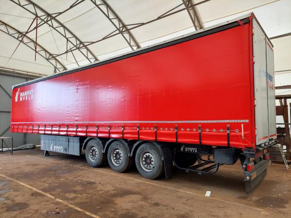 Полуприцеп маммут сн240-а шторный. Полуприцепы маммут. Полуприцеп мамут шторный. Мамут полуприцеп. Полуприцеп маммут сн240-а шторный.