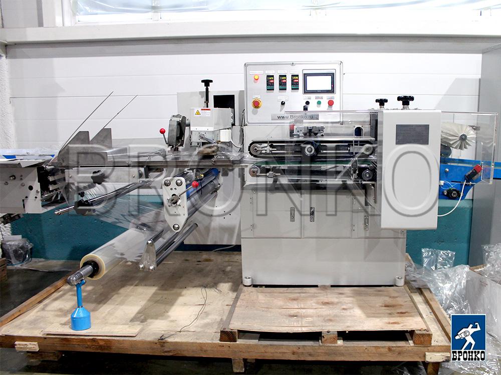 Сервоприводная горизонтальная упаковочная машина Bronkomatic-900X-Servo, доставка из Ростов-на-Дону