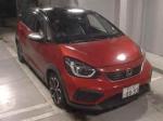 Кроссовер гибрид Honda Fit кузов GR6 модификация e:HEV Crosstar Hybrid гв 2020 пробег 42 т.км красный