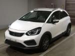 Кроссовер гибрид Honda Fit кузов GR6 модификация e:HEV Crosstar Hybrid гв 2021 пробег 5 т.км белый