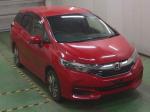 Универсал гибрид Honda Shuttle Hybrid кузов GP8 модификация Hybrid гв 2016 4wd пробег 213 т.км красный